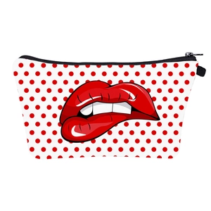 Lip print makeup bag with red polka dots and black zipper closure for women