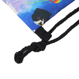 Close-up of durable reinforced stitching and thick black drawstring on star cat canvas bag