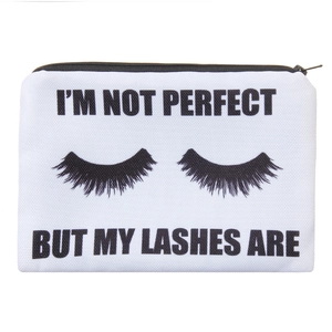 Detail of square canvas makeup bag with I'M NOT PERFECT print and smooth black zipper