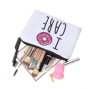 3D donut printed white canvas makeup bag with zipper closure and beauty accessories