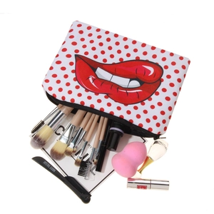 White canvas makeup bag with red polka dots and pop art lip print with cosmetic storage