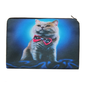 Close-up of 3D cat print makeup bag with smooth metal zipper and canvas fabric texture