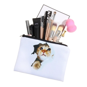 3D printed calico cat white canvas makeup bag showing storage capacity with cosmetics