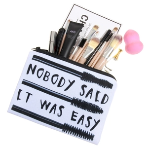 3D black and white letter print canvas makeup pouch with zipper and mascara graphic