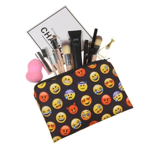 Black 3D emoji printed makeup bag with cosmetic brushes and accessories storage