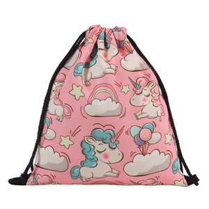Detailed view of pink unicorn drawstring bag with clouds and rainbows on fabric