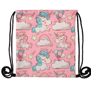 Detailed view of pink drawstring bag with cartoon unicorn, rainbow and cloud patterns