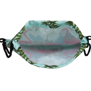 Blue tropical drawstring bag with pink flamingo and palm leaves print for travel