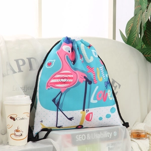Sky blue drawstring backpack featuring a pink flamingo on a scooter with Love text