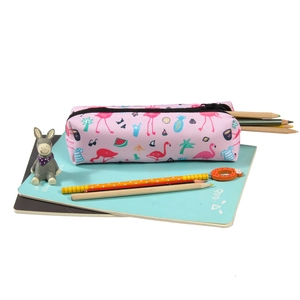 Detail of pink flamingo print canvas makeup bag with tropical fruits on notebooks
