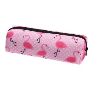 Detail of pink canvas makeup bag with flamingo patterns and black zipper closure