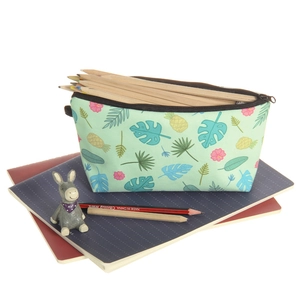 Tropical mint green canvas makeup bag with botanical leaves and floral prints