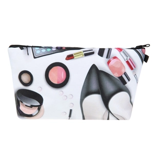 Detail of a white makeup bag showing colorful cosmetic prints and top zipper closure
