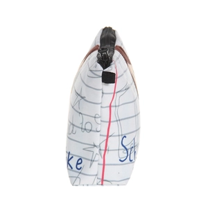 Detailed side view showing the zipper and notebook pattern of the school storage bag