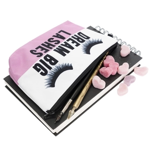 Pink and white makeup bag with Dream Big Lashes quote and eyelash graphic print