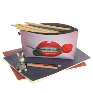 Detail of red lips rose makeup pouch showing zipper closure and stationery storage