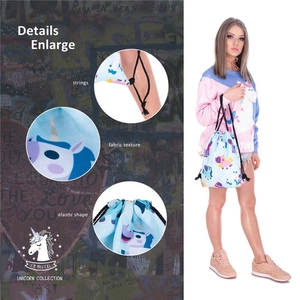 Detailed view of unicorn print drawstring bag featuring reinforced black ropes and fabric