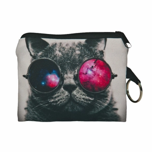 Detailed close-up of a square canvas coin purse with digital cat print and metal keychain