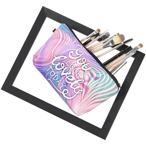 Colorful marble makeup bag with 'You Look Lovely Today' print and cosmetic brushes