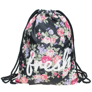 Detailed close-up of floral drawstring backpack with white fresh text print