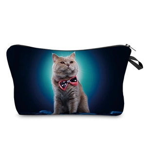 Blue British Shorthair cat print makeup bag with red bow tie on black background