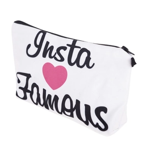 White canvas makeup bag with Insta Famous print and pink heart design for women