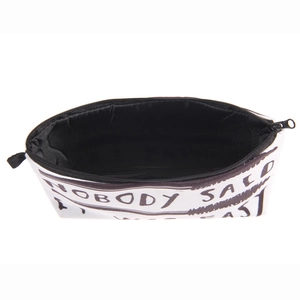 White canvas makeup bag with black letter print and zipper closure for storage