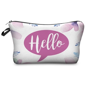 Close-up of floral makeup bag with Hello print, canvas texture and black zipper