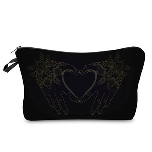 Cosmetic bag with gold hand heart mandala print on black pouch and zipper strap