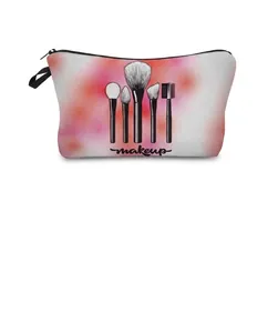Detailed view of the zipper closure and hanging strap on the watercolor makeup bag