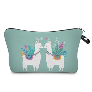 Detail view of the green canvas makeup bag featuring a cute llama kiss print and zipper