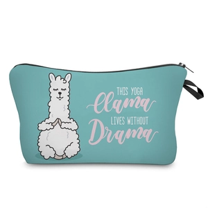 Detail of teal makeup bag with yoga llama print and THIS YOGA llama LIVES WITHOUT Drama text