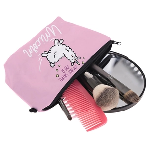 Pink unicorn llama makeup bag with travel accessories on white background