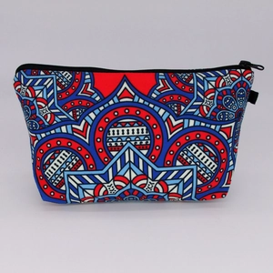 Detail view of colorful mandala pattern makeup bag with durable black metal zipper top