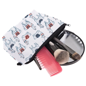 White canvas llama print makeup bag with zipper, including hairbrushes and mirror