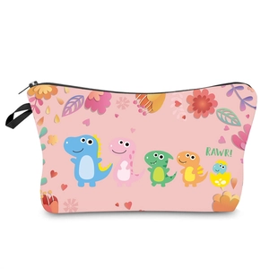 Detail of pink waterproof makeup bag featuring colorful cartoon dinosaur patterns and sturdy zipper
