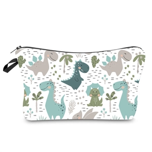 Close-up of waterproof makeup bag with cartoon dinosaur prints and black zipper closure