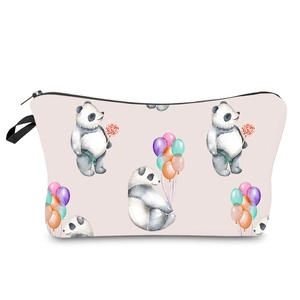 Detail of water resistant panda print cosmetic bag with secure black zipper and wrist strap