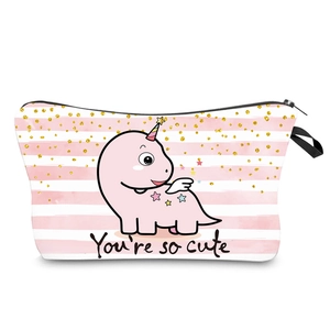 Detail view of the waterproof pink striped makeup bag with cute dinosaur print