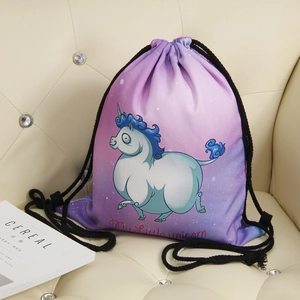 Unicorn drawstring backpack with purple gradient and cute illustration on leather sofa