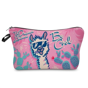 Detail of pink llama makeup bag with black zipper and cactus pattern prints