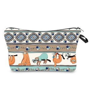 Close-up of waterproof cosmetic bag with sloth patterns and black fabric handle