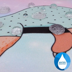 Macro detail showing water resistant coating and droplets on sloth print travel makeup bag