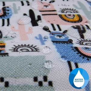 Macro shot of water droplets on water-resistant alpaca print fabric storage bag