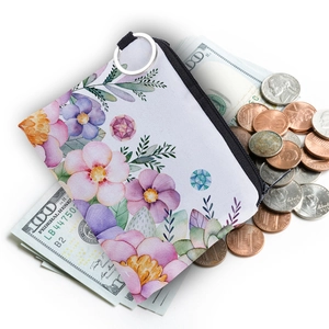 Floral watercolor canvas coin purse with zipper and keyring shown with cash