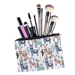 Square makeup bag with cartoon alpaca and cactus prints featuring black zipper closure