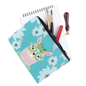 Detailed view of tiffany blue alpaca cosmetic bag with stationery and wax seal tools