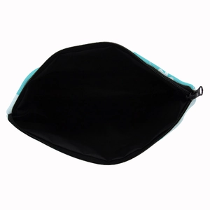 Light blue alpaca cosmetic bag with black fabric lining and durable zipper closure