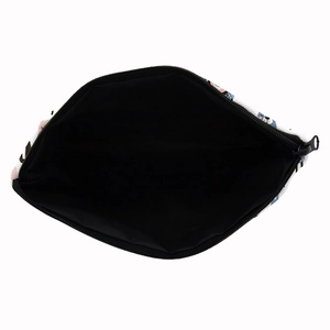 Square cosmetic bag with cactus and alpaca print featuring a black metal zipper closure