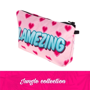 Pink cosmetic bag with all-over heart print and Lamezing lettering for travel storage